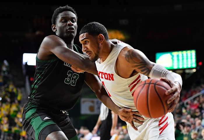 Dayton's Obi Toppin drives to the basket during a game against George Mason.